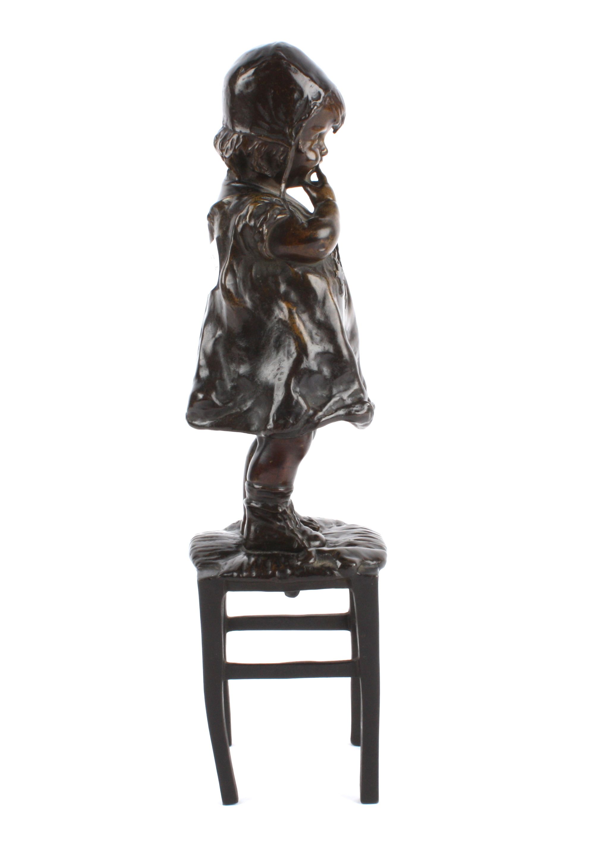 Juan Clara, Spanish (1875 - 1958) a bronze figure of a young girl standing upon a rush seated - Image 2 of 4