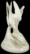 A Royal Doulton porcelain doves entitled 'Courtship' from the 'Images' collection, a seated dove