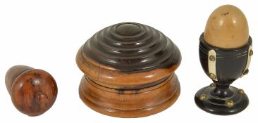 A walnut acorn shaped pin cushion, 20th century the turned finial on the top, velvet cushion