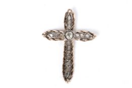An antique diamond set cross pendant the centre set with a single stone diamond approx. 0.40ct in