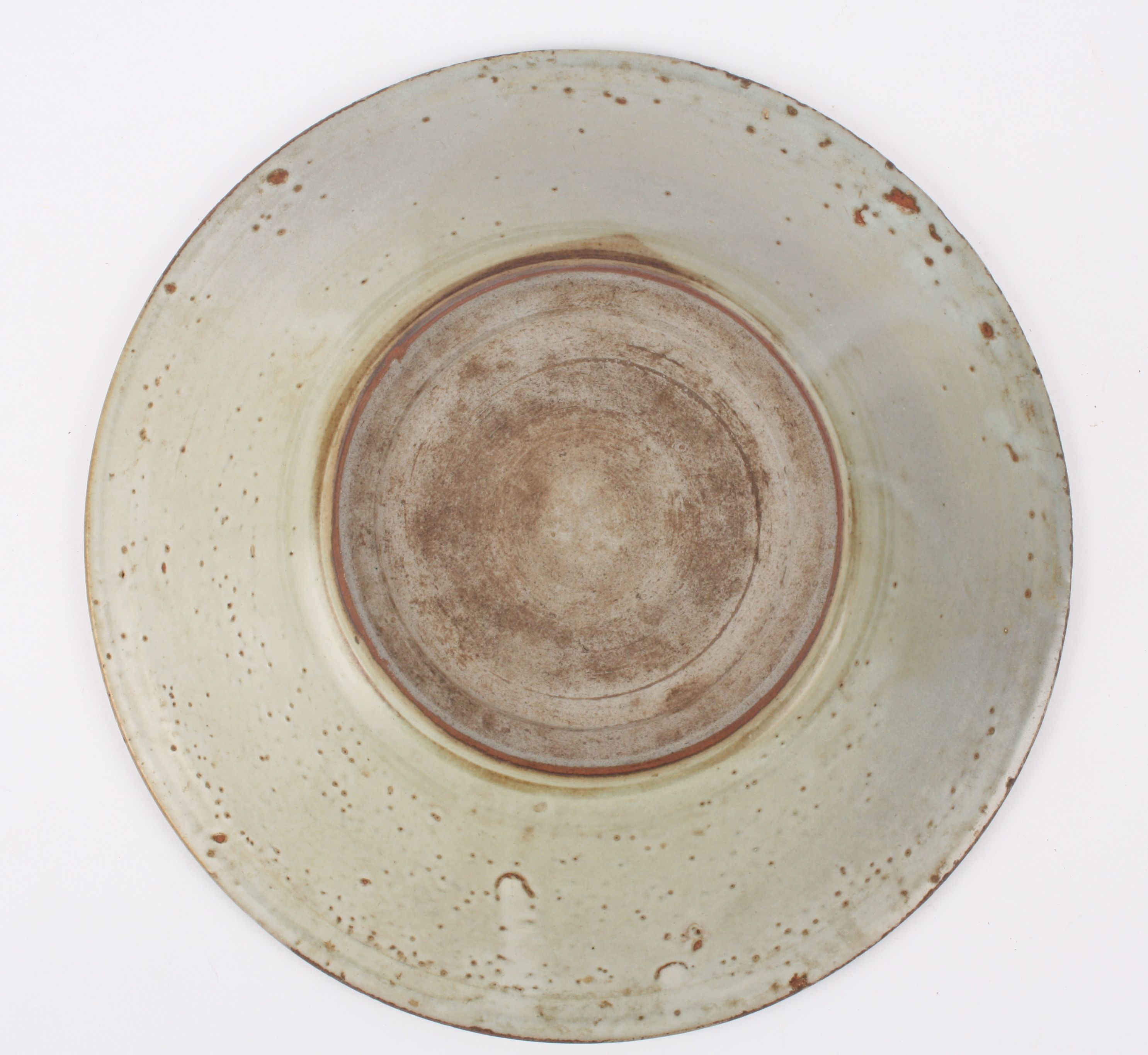 An 18th Century Chinese Swatow pale Celadon pottery dish the raised edge painted with planted - Image 3 of 3