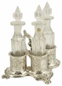 A Victorian silver three piece cruet suite, London 1849 comprising of three glass polygon formed