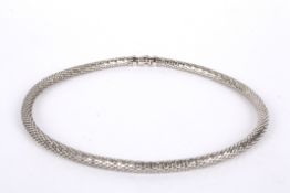 A Contemporary simple 9ct white gold choker of articulated mesh design approx weight 20.1 gm.