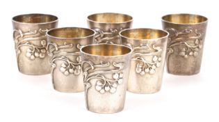 A good set of six silver gilt Art Nouveau shot cups, hallmarked, possibly Canadian 1890-1910, of