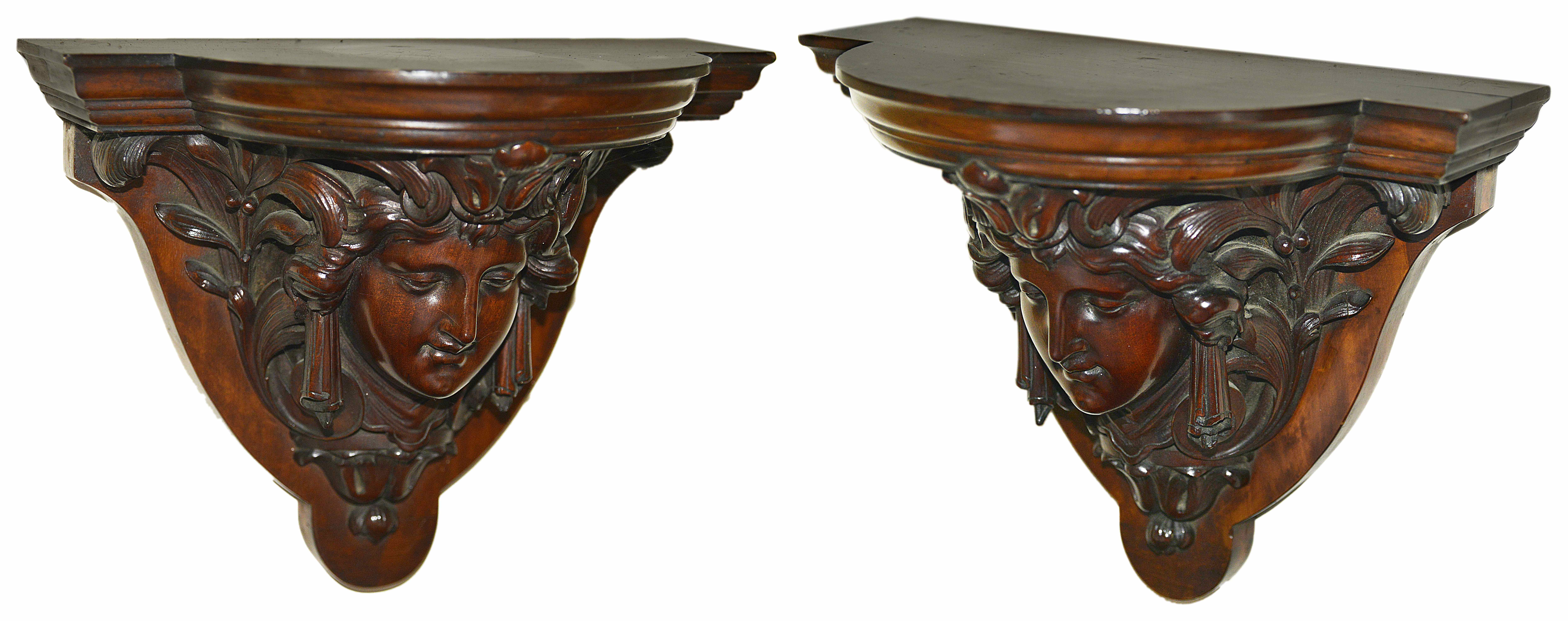 A pair of mahogany wall brackets, late 19th century modelled as a female face flanked by acanthus - Image 2 of 2