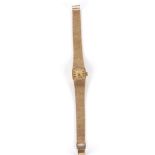 A Longines 9ct gold ladies wind mechanism bracelet watch the square dial with baton markers and with