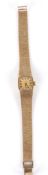 A Longines 9ct gold ladies wind mechanism bracelet watch the square dial with baton markers and with