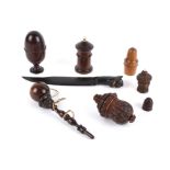 A nice collection of turned and carved treen sewing accoutrements, 19th century and later comprising