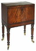 A mahogany rectangular cellerat, 19th century the hinged lid opening to reveal the interior with two