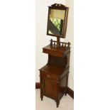 A gentleman's oak shaving stand and cupboard, 20th century the rectangular oak frame with mirror