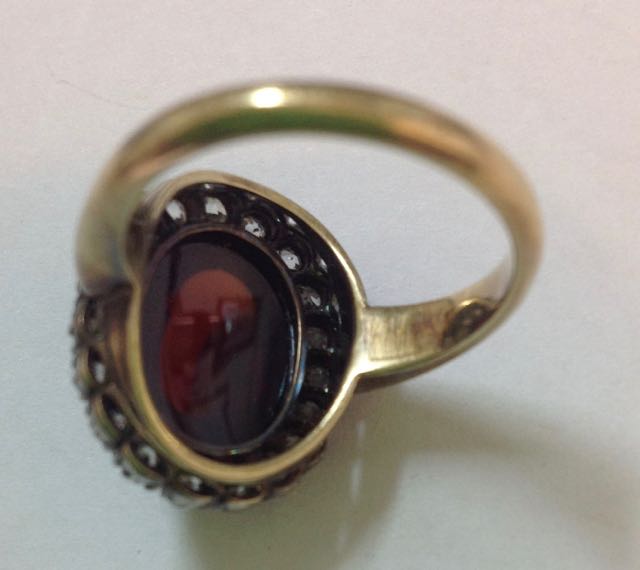 An Early Victorian cabochon garnet and diamond set oval cluster ring the large central garnet set - Image 5 of 6