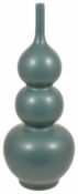 A late 20th Century triple gourd monochrome vase of even turquoise glaze impressed Yong Zheng seal