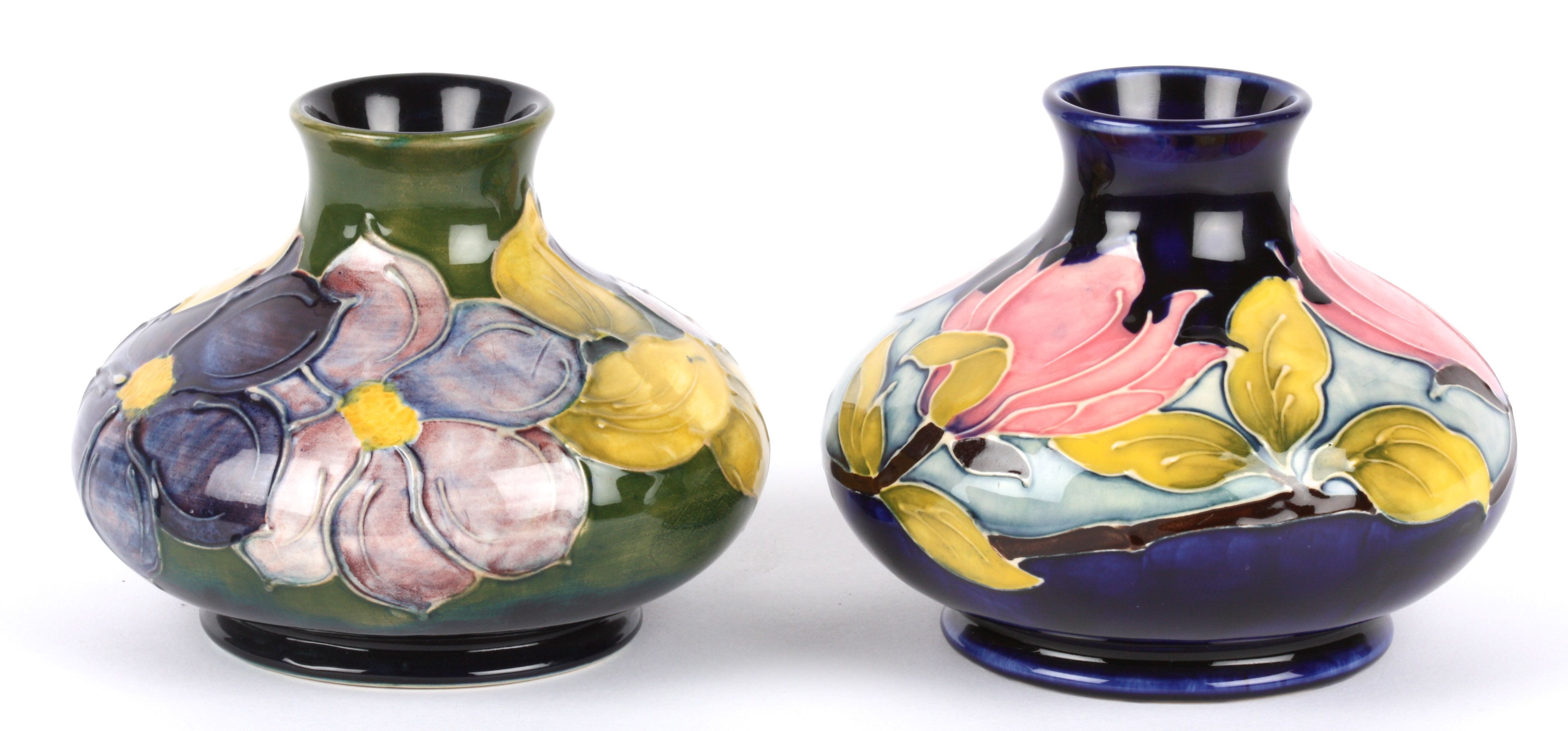 Two William Moorcroft tube lined squat vases, 20th century each decorated with floral sprays of - Image 2 of 3