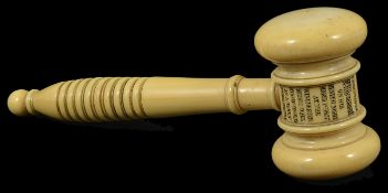 An ivory Gavel, 19th century of gavel form with turned handle, engraved "Presented to Mr H Beaumount