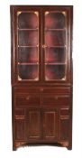 An Oriental hardwood cabinet, 20th century of rectangular form with two glazed doors with pierced