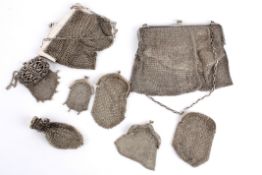 A good collection of eight silver mesh bags, comprising of French and English silver varying sized