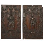 A pair of oak wall carvings, 19th century each of rectangular form with a central figure standing in