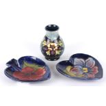 A William Moorcroft Clematis pattern tube lined heart shaped dish, 20th century together with a