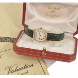 A Cartier Tortue 18ct yellow gold and diamond Ladies wristwatch the champagne dial with roman