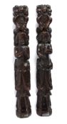 Two oak carved caryatids, late 18th/19th century of typical form with putti standing playing