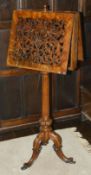 A Victorian walnut and mahogany music duet stand the upper section comprising of two rectangular