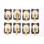 A collection of Art Nouveau ivory pendants with central figure of a lady playing a lyre of pierced