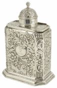 A Continental silver tea caddy, of rectangular form with embossed foliate decoration, with central