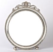 An Edwardian silver framed dressing table mirror, Birmingham 1908 with scallop shell and foliate