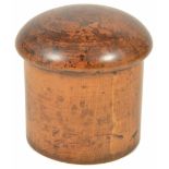 A fruit wood cylindrical tea caddy, early 20th century of cylindrical form with dome twist off