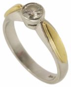 A single stone diamond set ring the stone approx. 0.25 ct. collet set in yellow and white 18ct