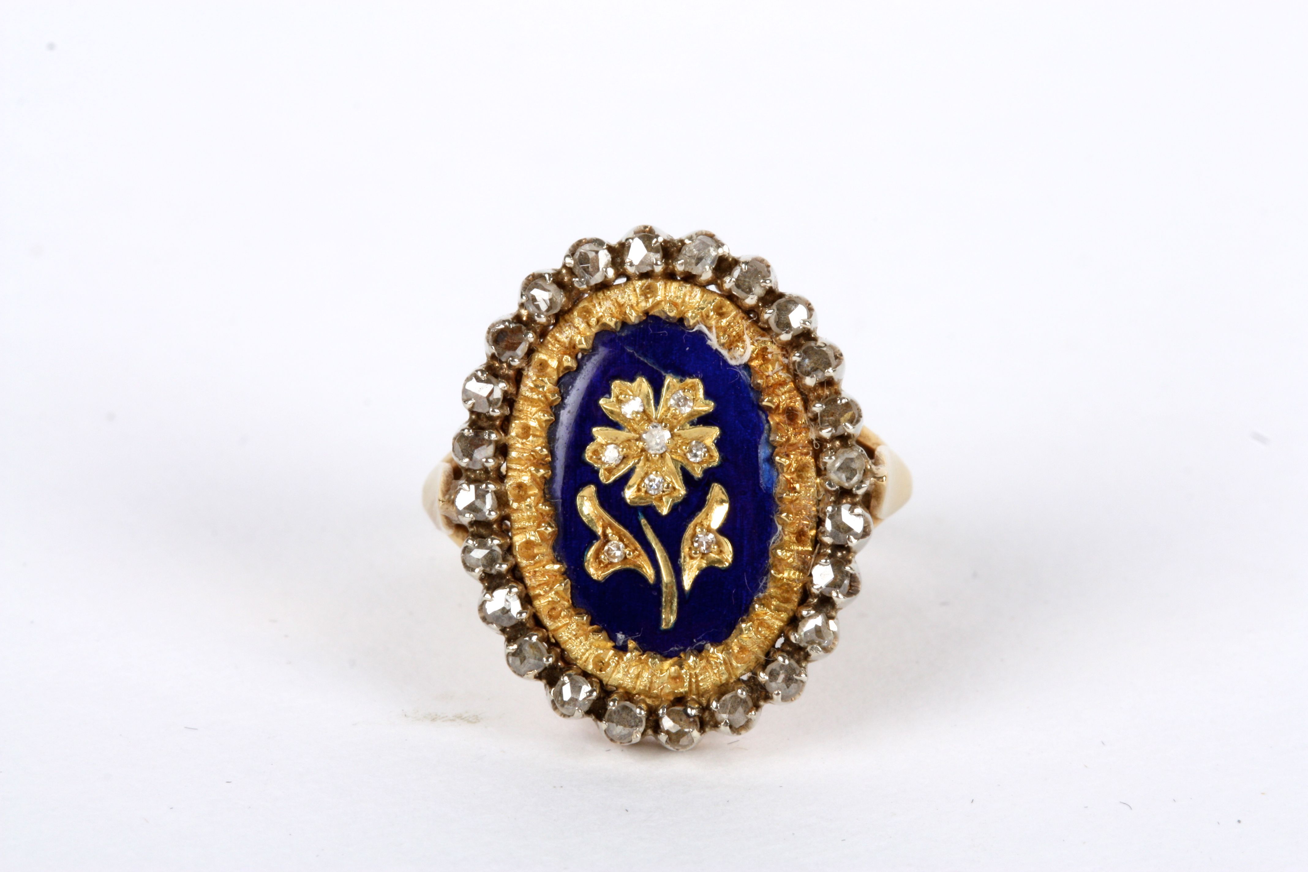 A Georgian blue enamel and rose diamond floral memorial ring The central oval with yellow gold