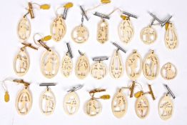 A similar collection of Art Deco ivory silhouette carvings with pendant/brooch fittings (qty)