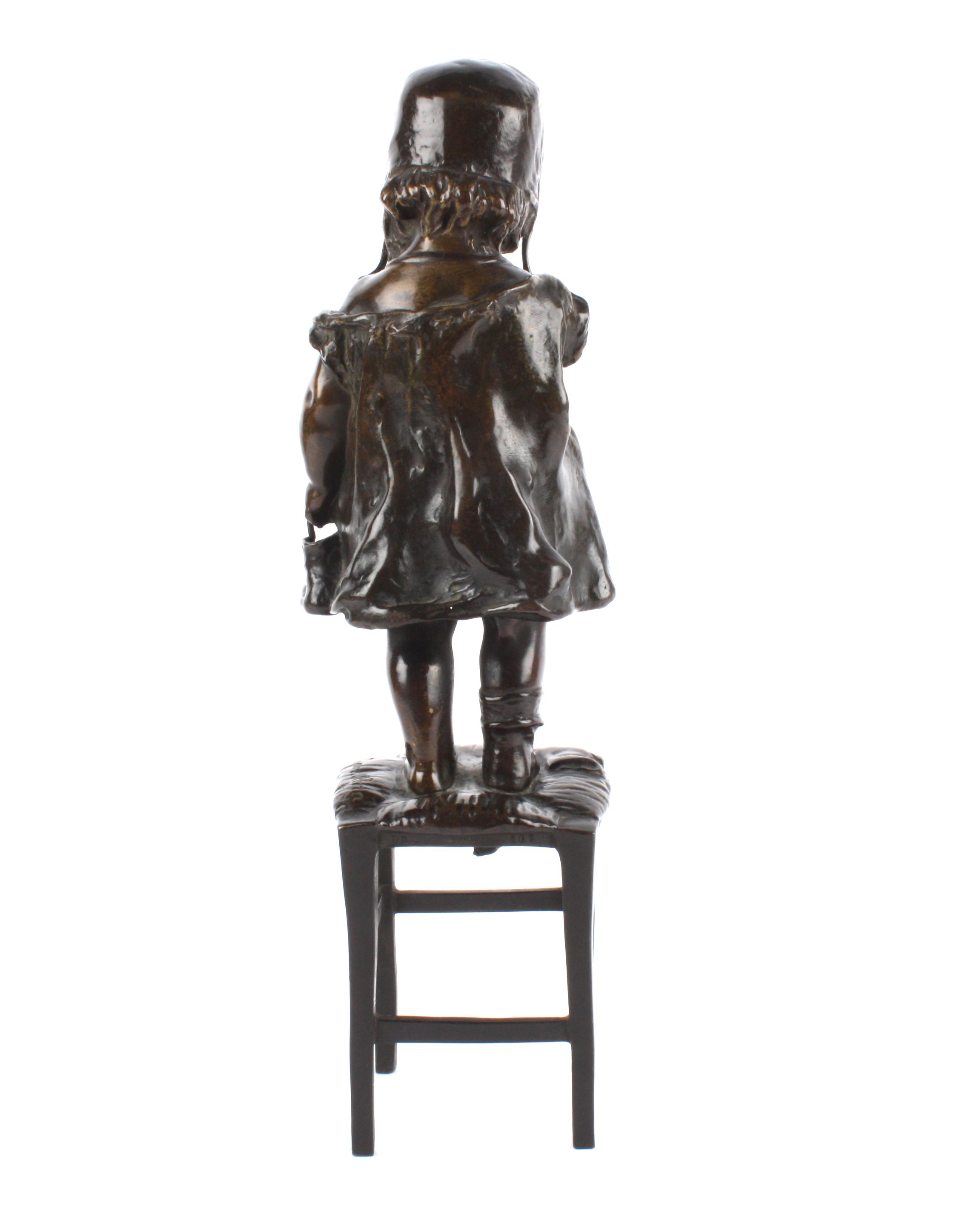 Juan Clara, Spanish (1875 - 1958) a bronze figure of a young girl standing upon a rush seated - Image 3 of 4