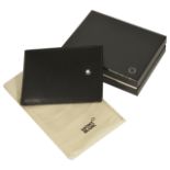 A Mont Blanc leather notebook/wallet, of typical rectangular form with Mont Blanc button monogram,