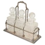 An impressive modern silver sectional decanter holder of tantalus form, Sheffield 1999 with three