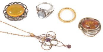 A small collection of Art Nouveau and later jewellery to include a yellow metal scroll drop