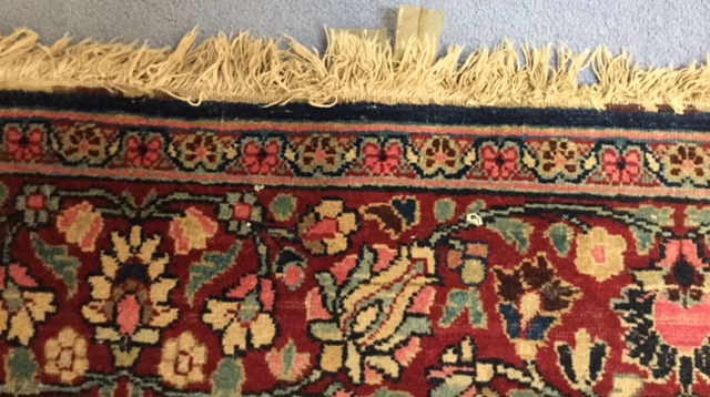 A pair of early 20th century Persian carpets the quartered madder field with central turquoise and - Image 3 of 6