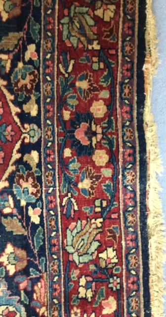 A pair of early 20th century Persian carpets the quartered madder field with central turquoise and - Image 4 of 6