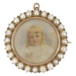 An Edwardian pearl framed portrait miniature pendant brooch the central circular portrait
