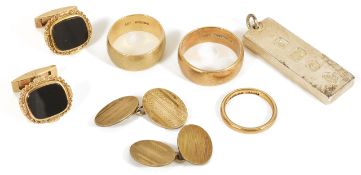 A small collection of gold wedding bands and cufflinks to include two gentlemen's large, wide 9ct