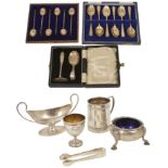 A collection of assorted silverware including a christening tankard hallmarked Birmingham 1921,