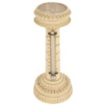 A late 19th century ivory compass thermometer, in the form of a column with circular compass inset