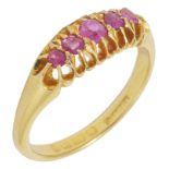An 18ct gold Victorian five stone ruby gypsy ring, the open claw setting set with five small
