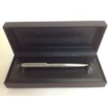 An Alfred Dunhill ballpoint pen, silvered body, in original brown box length: 14.2 cmCondition: