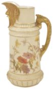 A Worcester blush ivory face mask jug, dated 1889 of cylindrical form with a gilt face mask spout,