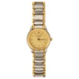A Longines ladies wristwatch a gold coloured dial with Roman numeral hours and baton minutes, with