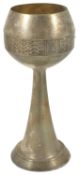 A WMF silver plated goblet, the bulbous bowl embossed with a band of fish scale decorated panels