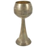 A WMF silver plated goblet, the bulbous bowl embossed with a band of fish scale decorated panels