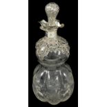 A Victorian silver mounted glass decanter, Birmingham 1899 the glass and silver flower head embossed