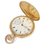 A Waltham USA 10ct gold plated full hunter pocket watch the white enamel dial with Roman numeral